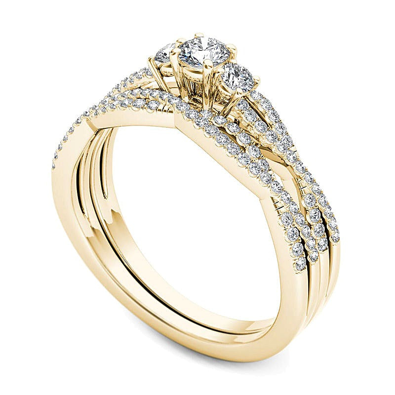0.5 CT. TW Diamond Three Stone Twist Bridal Set in 14K Gold