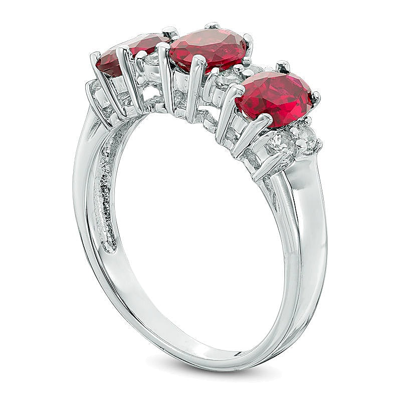 Oval Lab-Created Ruby and White Sapphire Three Stone Ring in 10K White Gold