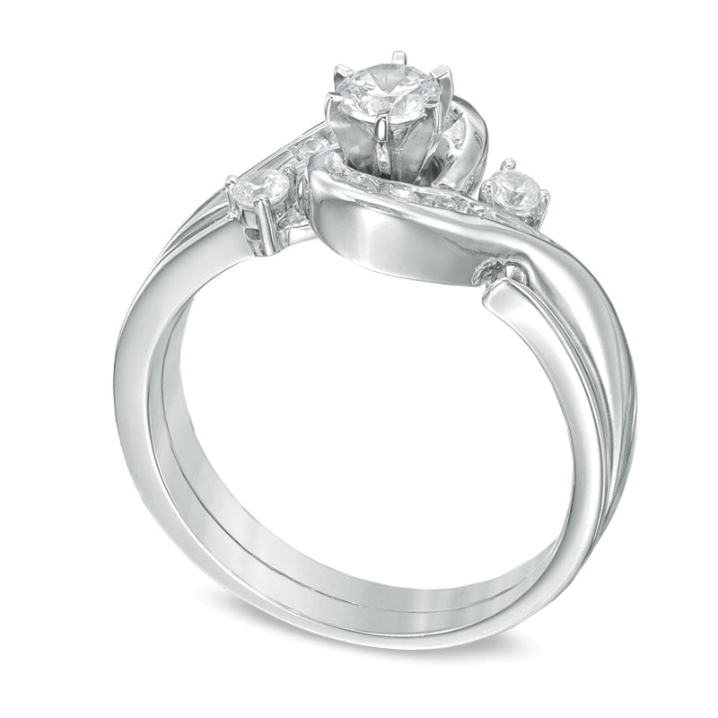 0.5 CT. TW Diamond Frame Bypass Bridal Set in 10K White Gold