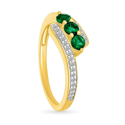 Lab-Created Emerald and 0.17 CT. TW Diamond Three Stone Bypass Ring in 10K Gold