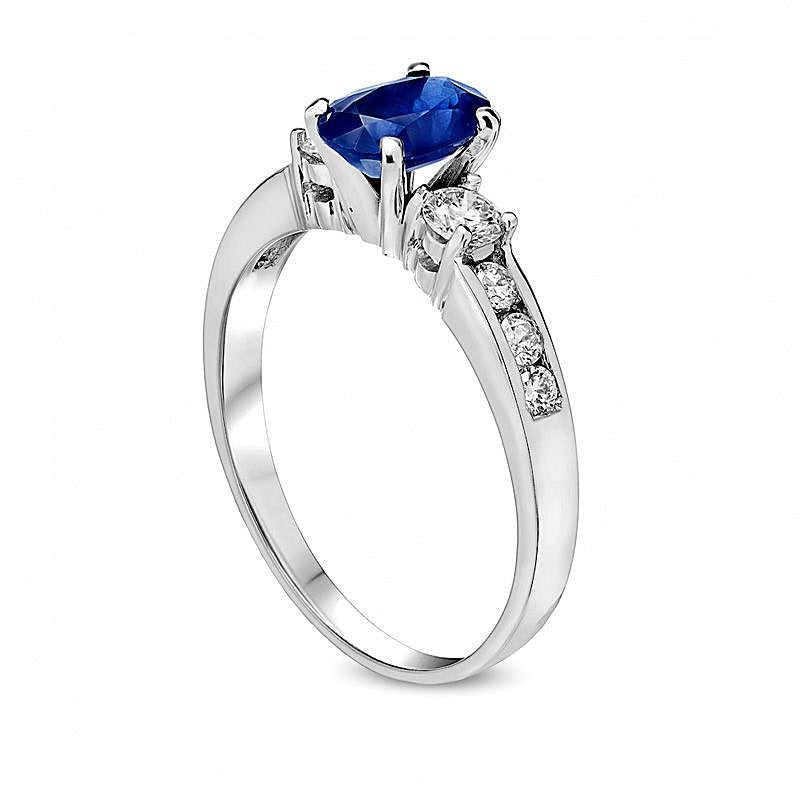 Oval Blue Sapphire and 0.38 CT. TW Diamond Three Stone Ring in 14K White Gold