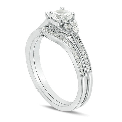 Lab-Created White Sapphire and 0.1 CT. TW Diamond Tri-Sides Bridal Set in Sterling Silver