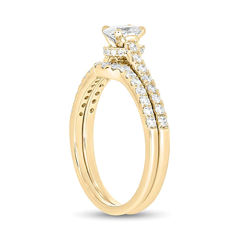 1.0 CT. TW Oval Diamond Bridal Set in 14K Gold (I/I2)
