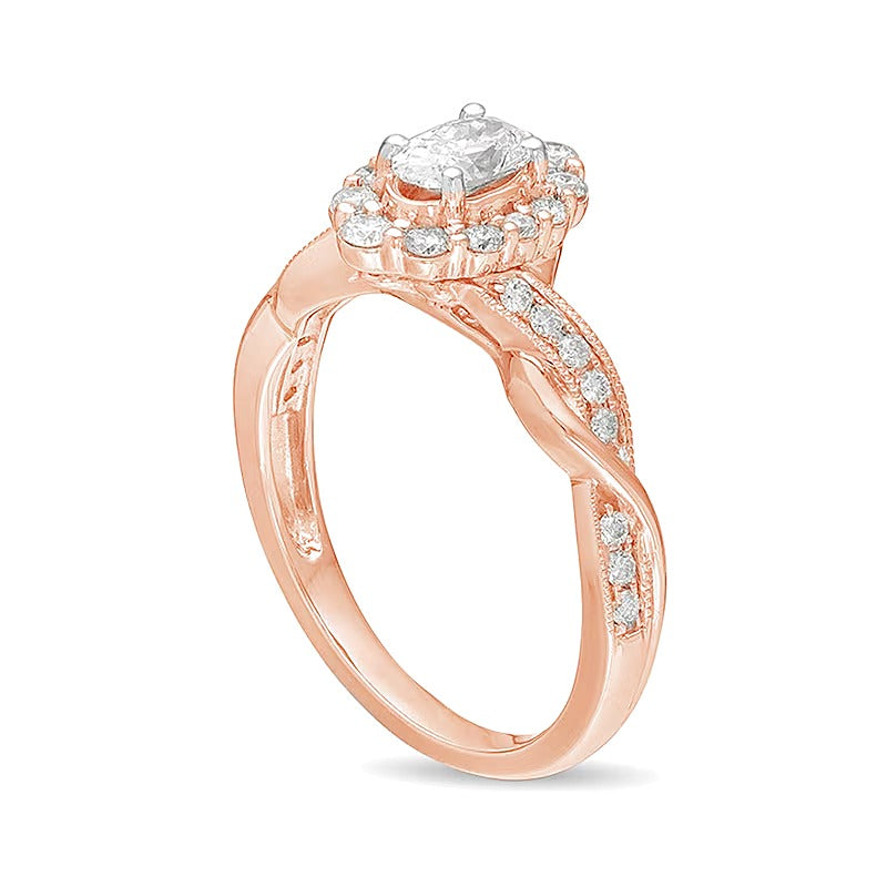 0.75 CT. TW Oval Diamond Frame Twist Shank Vintage-Style Engagement Ring in 10K Rose Gold