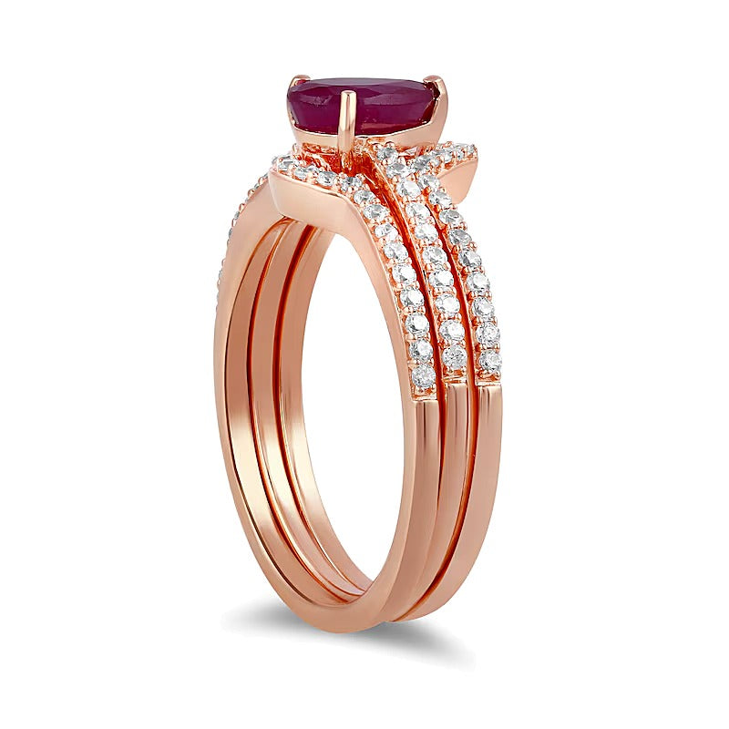 Pear-Shaped Ruby and 0.33 CT. TW Diamond Three-Piece Wedding Ring Set in 10K Rose Gold