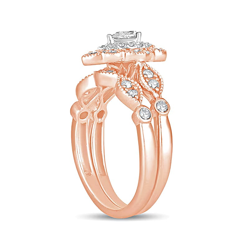 0.63 CT. TW Pear-Shaped Diamond Double Petal Frame Vintage-Style Bridal Set in 10K Rose Gold
