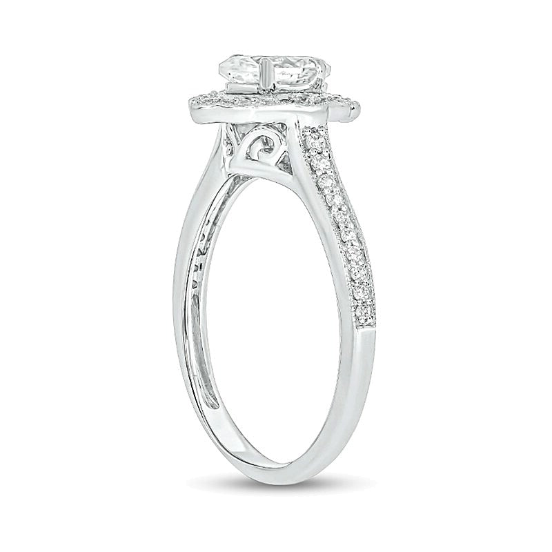 0.75 CT. TW Oval Diamond Flower Frame Vintage-Style Engagement Ring in 14K White Gold (I/I2)