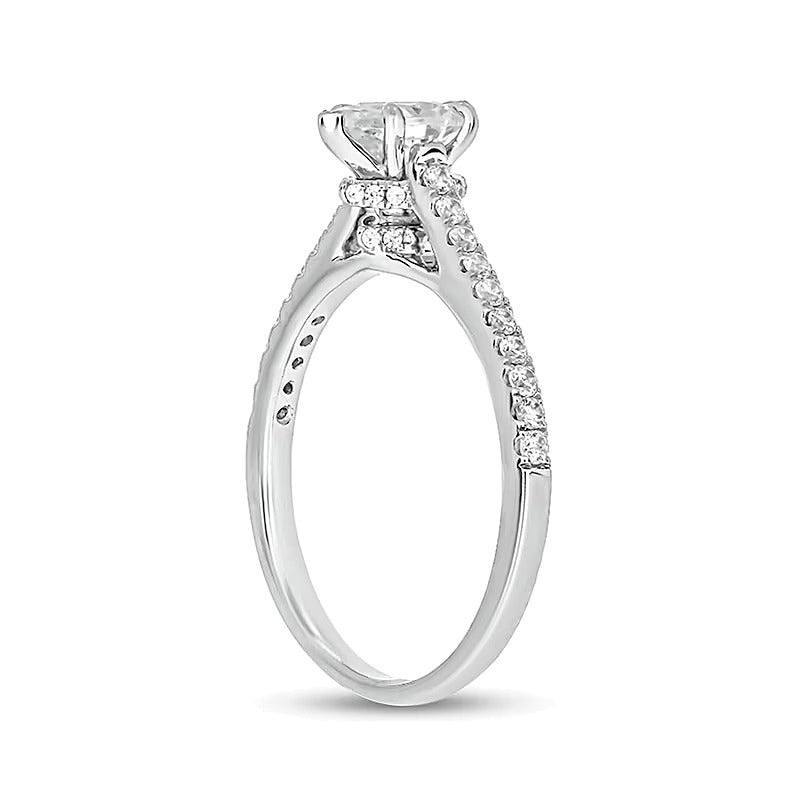 0.75 CT. TW Pear-Shaped Diamond Engagement Ring in 14K White Gold (I/I2)