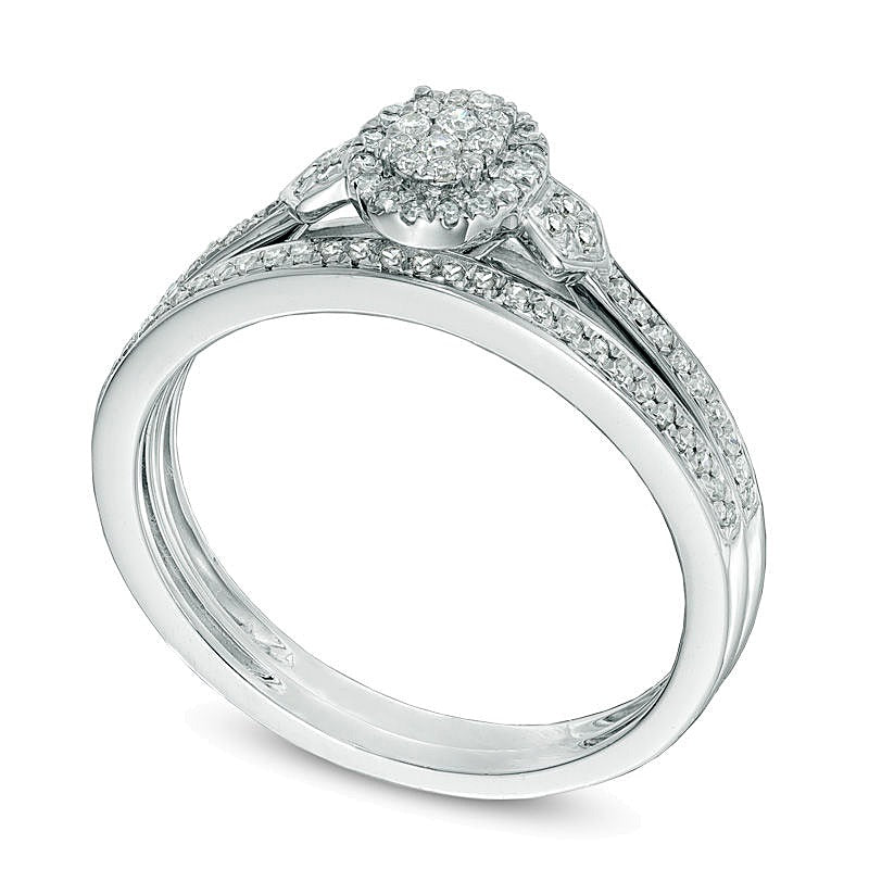 0.2 CT. TW Oval-Shaped Multi-Diamond Bridal Set in 10K White Gold