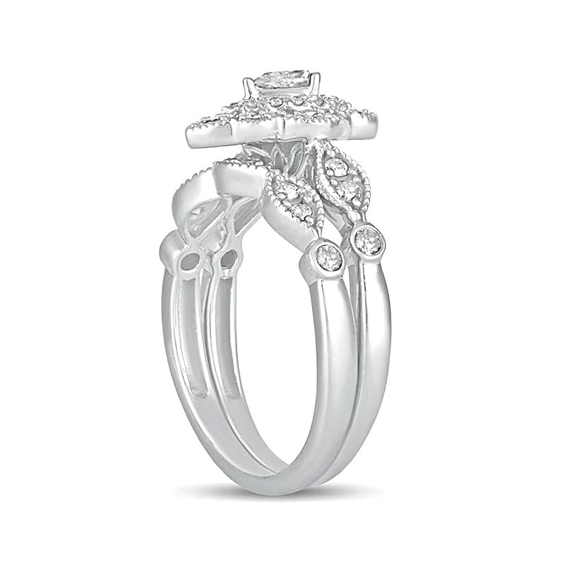 0.63 CT. TW Pear-Shaped Diamond Double Petal Frame Vintage-Style Bridal Set in 10K White Gold