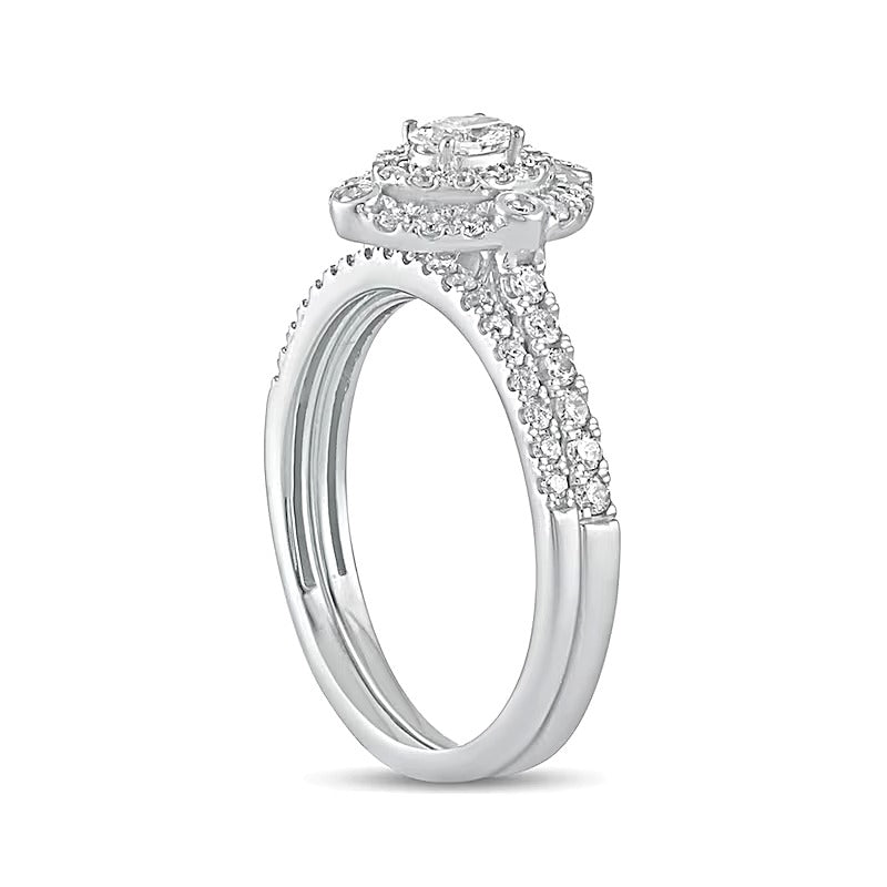 0.63 CT. TW Oval Diamond Double Frame Bridal Set in 10K White Gold