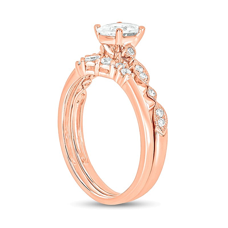 0.75 CT. TW Oval Diamond Contour Vintage-Style Bridal Set in 14K Rose Gold (I/I2)