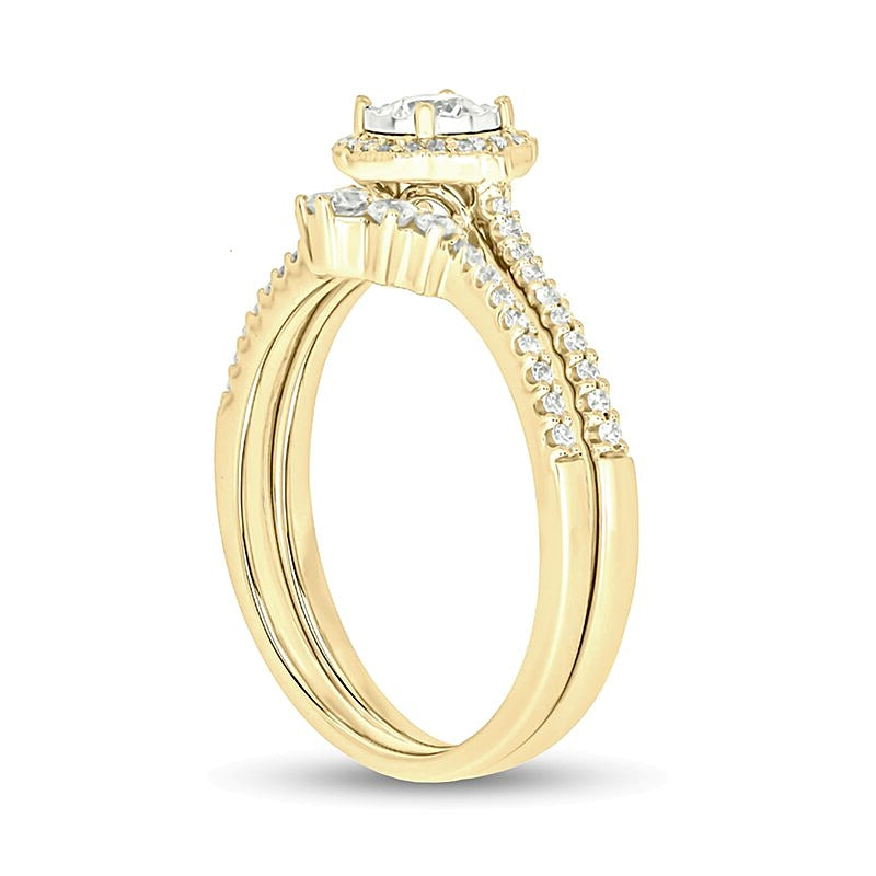 0.5 CT. TW Diamond Frame Vintage-Style Flower Bridal Set in 10K Gold (I/I2)