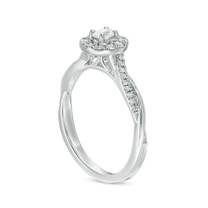 0.38 CT. TW Oval Diamond Frame Twist Engagement Ring in 10K White Gold