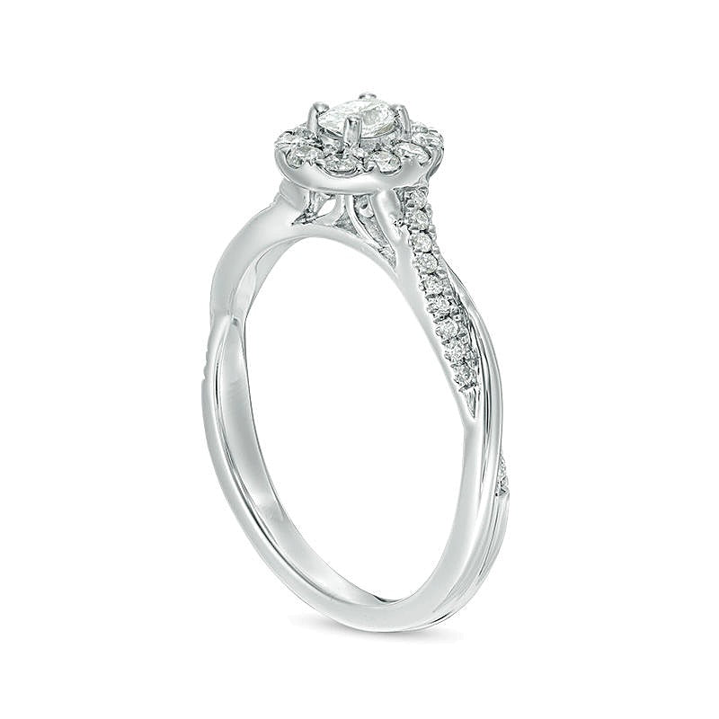 0.38 CT. TW Oval Diamond Frame Twist Engagement Ring in 10K White Gold