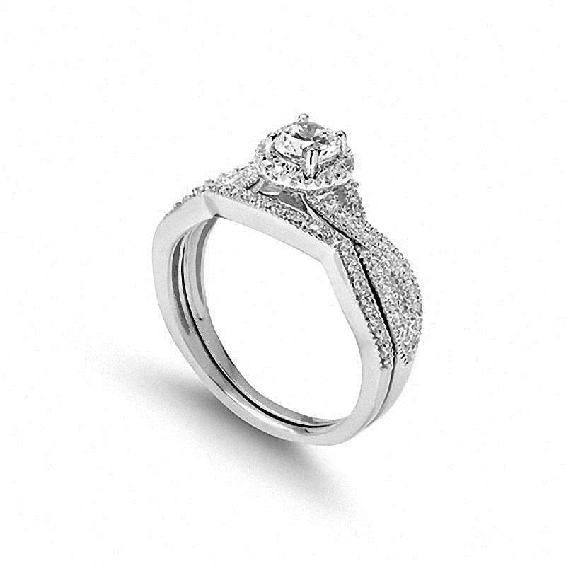 0.75 CT. TW Diamond Twist Shank Bridal Set in 14K White Gold