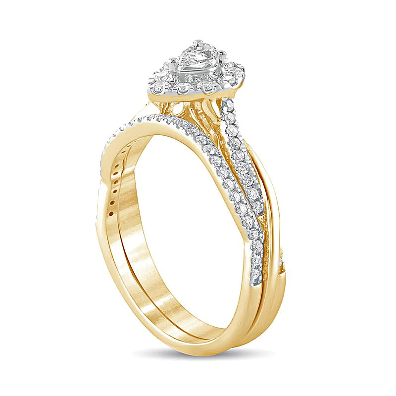 0.5 CT. TW Pear-Shaped Diamond Frame Twist Shank Bridal Set in 10K Gold