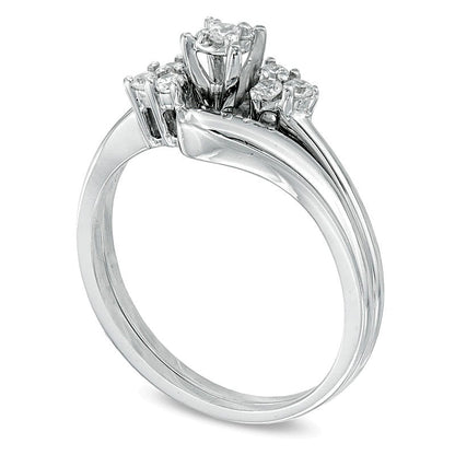 0.17 CT. TW Diamond Three Stone Slant Bridal Set in 10K White Gold