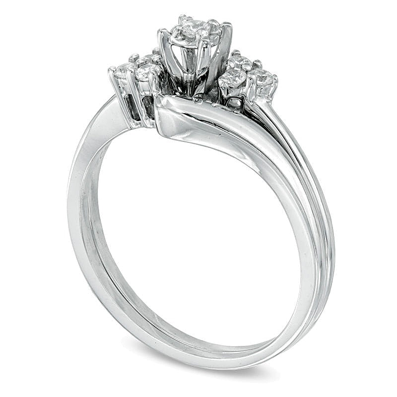 0.17 CT. TW Diamond Three Stone Slant Bridal Set in 10K White Gold