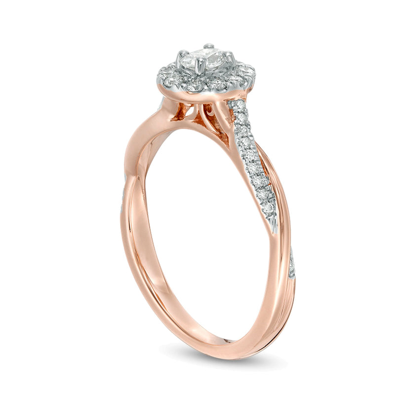 0.38 CT. TW Oval Diamond Frame Twist Engagement Ring in 10K Rose Gold