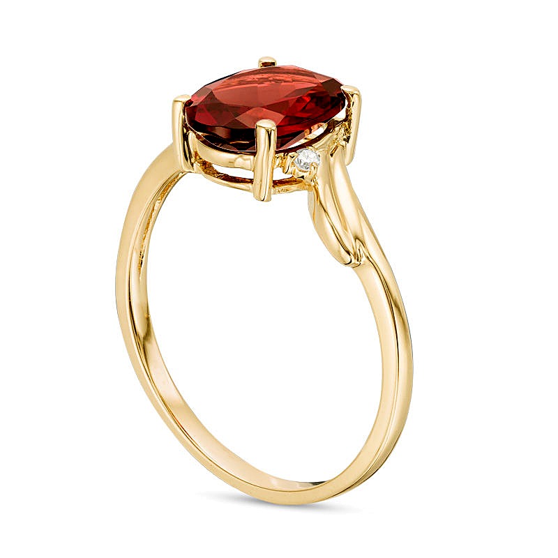 Oval Garnet and Diamond Accent Bypass Swirl Shank Ring in 10K Gold