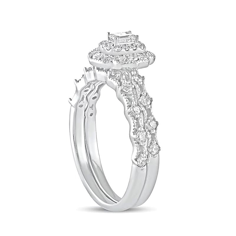 0.63 CT. TW Emerald-Cut Diamond Frame Vintage-Style Bridal Set in 10K White Gold