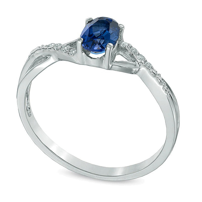 Oval Lab-Created Blue Sapphire and Diamond Accent Twist Engagement Ring in 10K White Gold