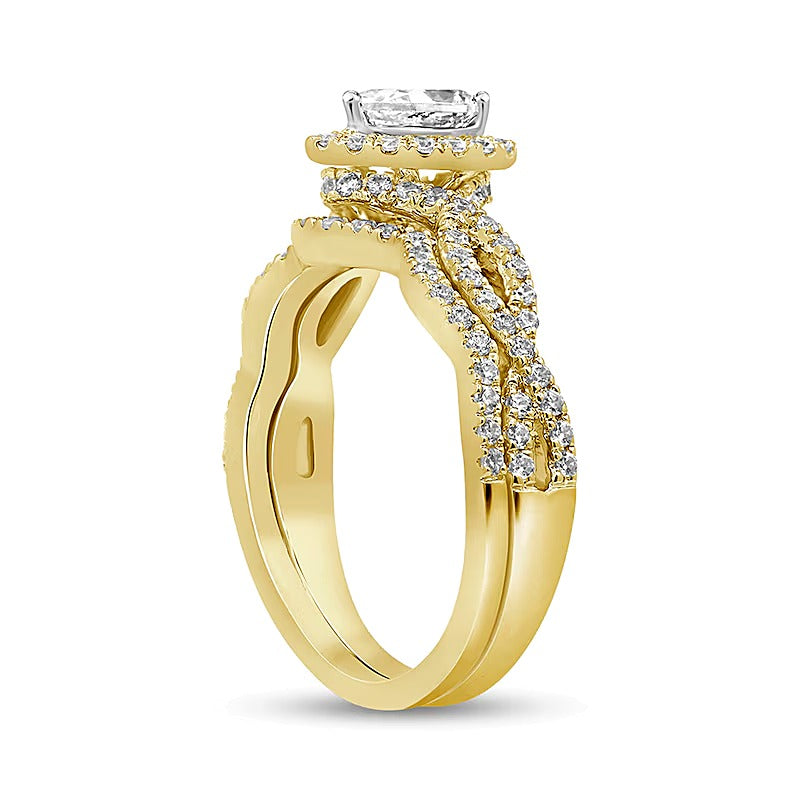 1.0 CT. TW Pear-Shaped Diamond Twist Shank Bridal Set in 14K Gold (I/I2)