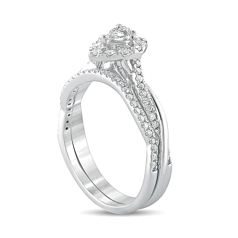 0.5 CT. TW Pear-Shaped Diamond Frame Twist Shank Bridal Set in 10K White Gold