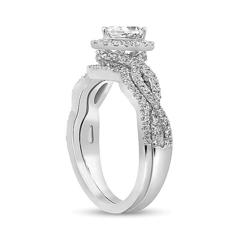1.0 CT. TW Pear-Shaped Diamond Twist Shank Bridal Set in 14K White Gold (I/I2)