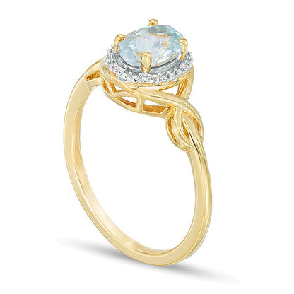 Oval Aquamarine and Diamond Accent Twist Ring in 10K Gold