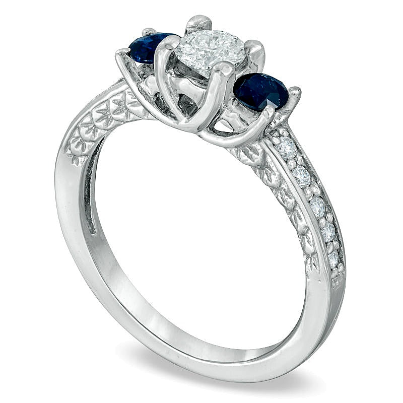 0.5 CT. TW Diamond and Blue Sapphire Three Stone Engagement Ring in 14K White Gold