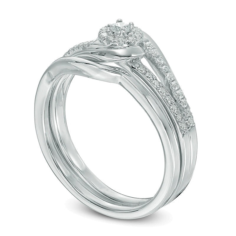 0.25 CT. TW Diamond Swirl Frame Bridal Set in 10K White Gold