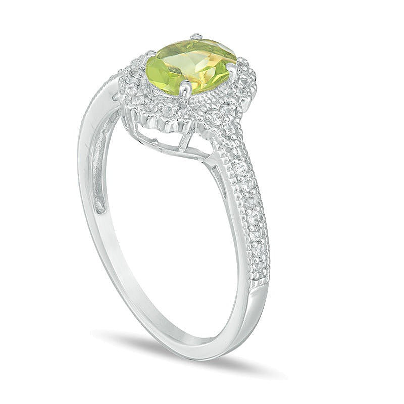 Oval Peridot and 0.13 CT. TW Diamond Frame Vintage-Style Ring in 10K White Gold