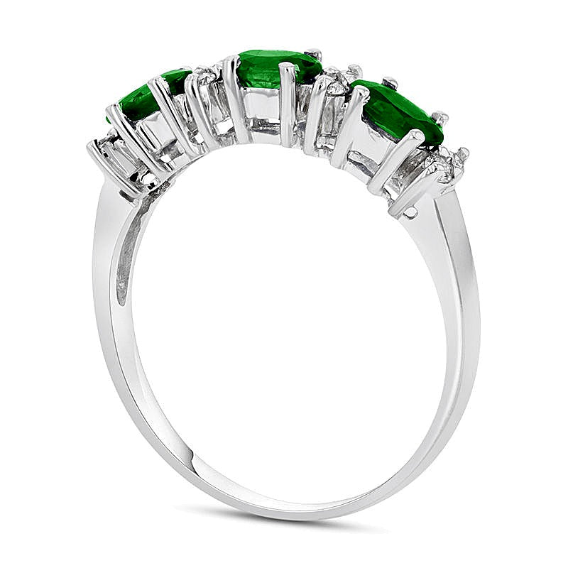 Sideways Oval Emerald and 0.1 CT. TW Diamond Three Stone Ring in 14K White Gold