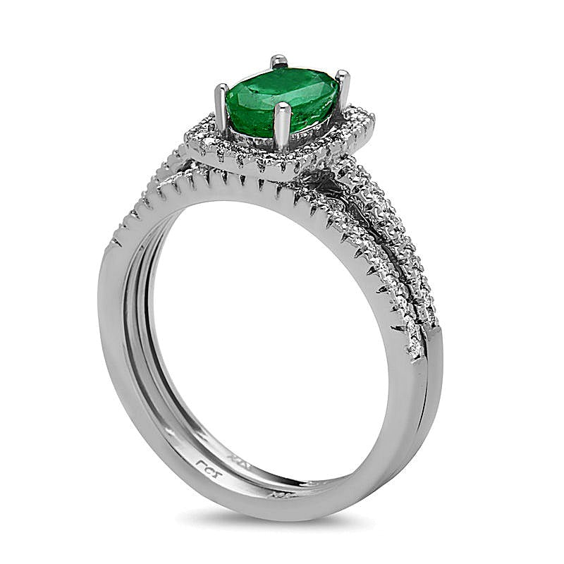 Oval Emerald and 0.33 CT. TW Diamond Frame Bridal Set in 14K White Gold