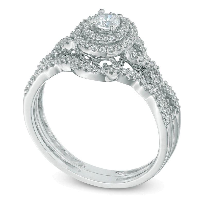 0.5 CT. TW Diamond Oval Frame Loose Braid Bridal Set in 10K White Gold