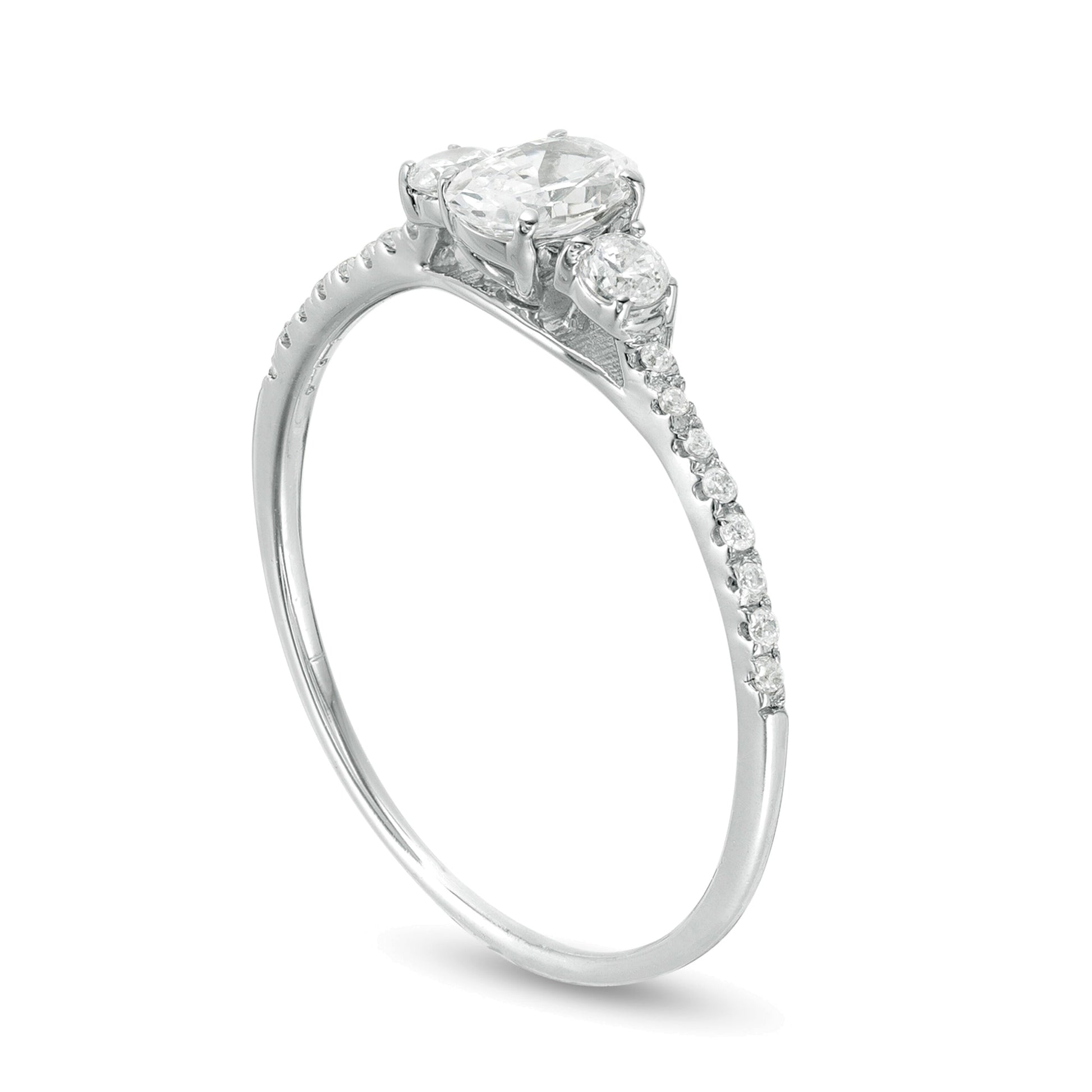 0.63 CT. TW Oval and Round Diamond Three Stone Engagement Ring in 14K White Gold