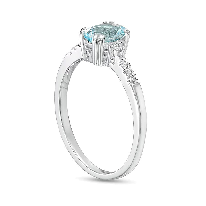 Oval Aquamarine and 0.1 CT. TW Diamond Ring in 10K White Gold