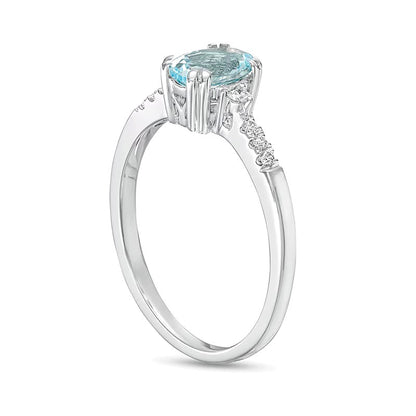 Oval Aquamarine and 0.1 CT. TW Diamond Ring in 10K White Gold