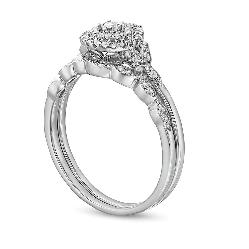 0.25 CT. TW Pear-Shaped Multi-Diamond Vintage Style Bridal Set in 10K White Gold