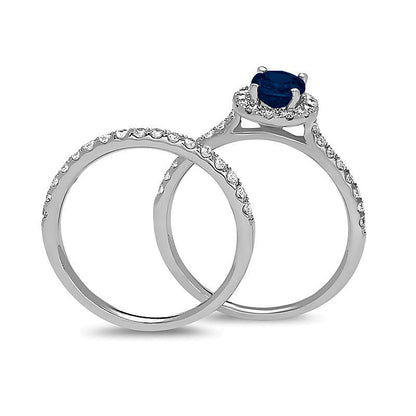 Oval Blue Sapphire and 0.63 CT. TW Diamond Frame Bridal Set in 14K White Gold
