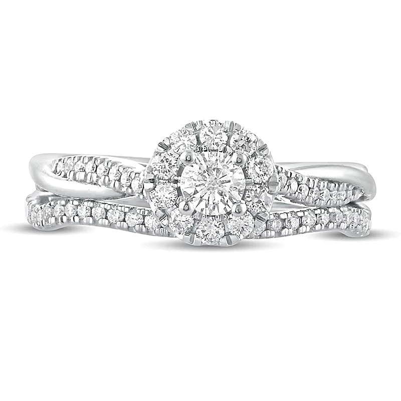 0.5 CT. TW Diamond Frame Twist Shank Bridal Set in 10K White Gold