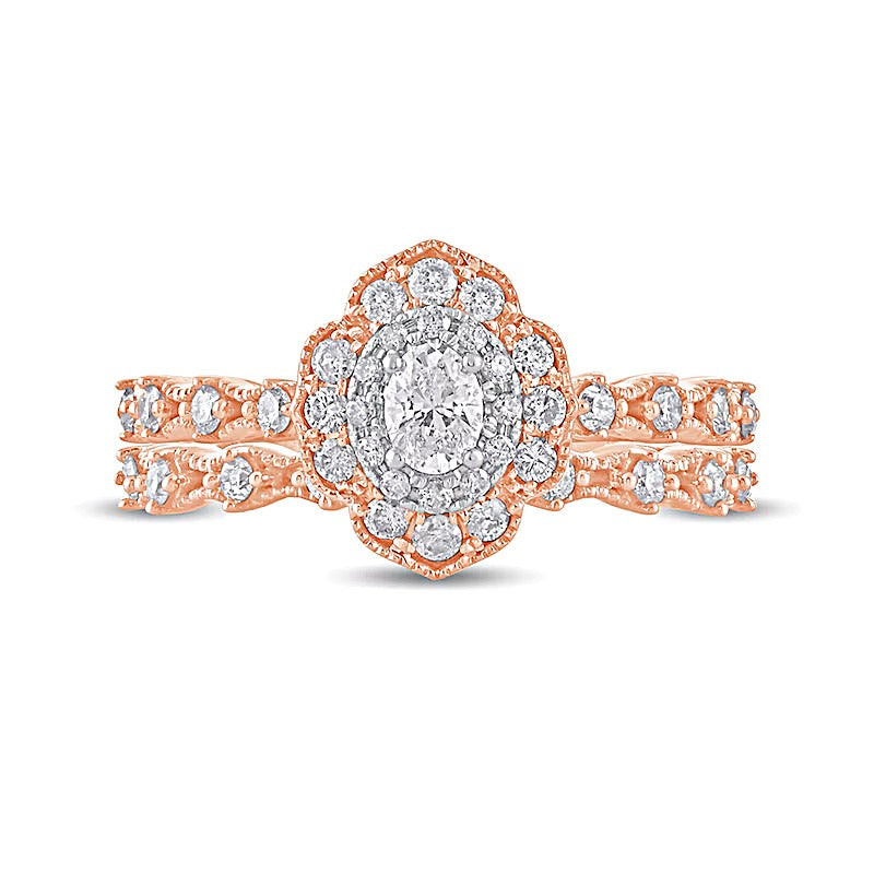 0.63 CT. TW Oval Diamond Frame Vintage-Style Bridal Set in 10K Rose Gold