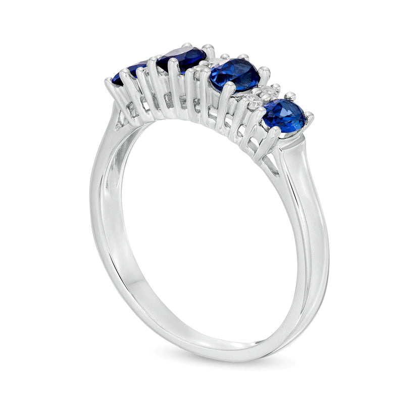 Oval Blue Sapphire and 0.1 CT. TW Diamond Duo Alternating Four Stone Ring in 14K White Gold