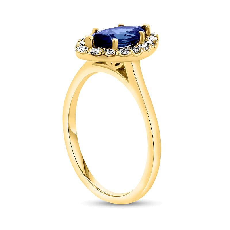 Marquise Blue Sapphire and 0.25 CT. TW Diamond Frame Ring in 14K Gold