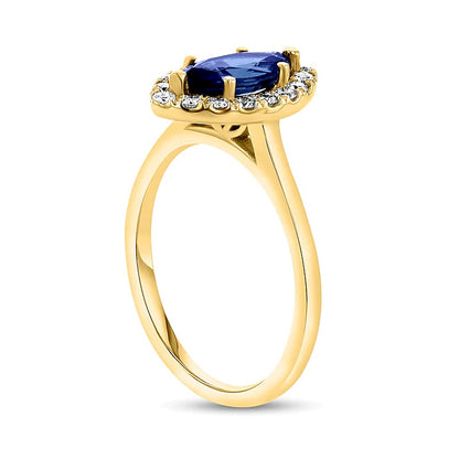Marquise Blue Sapphire and 0.25 CT. TW Diamond Frame Ring in 14K Gold