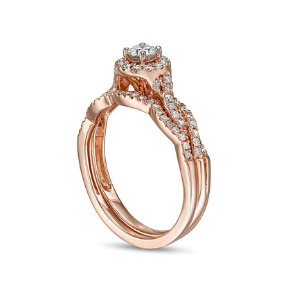 0.5 CT. TW Diamond Frame Twist Shank Bridal Set in 10K Rose Gold (I/I2)