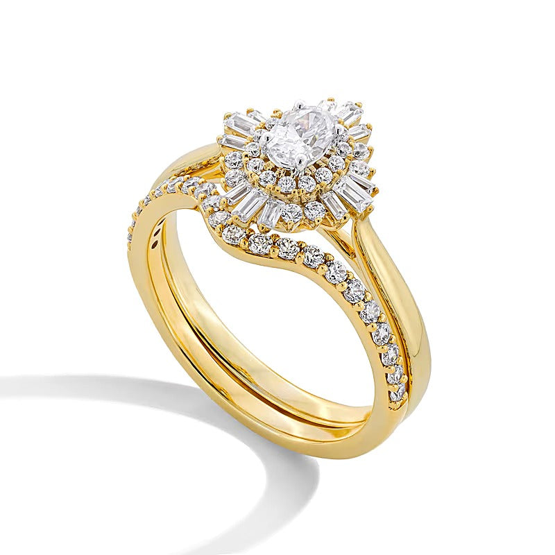 0.75 CT. TW Oval Diamond Double Sunburst Frame Bridal Set in 14K Gold