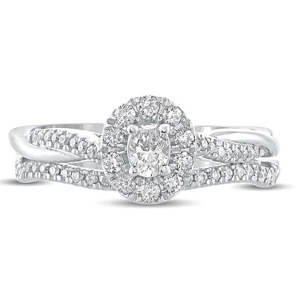 0.5 CT. TW Oval Diamond Frame Twist Shank Bridal Set in 10K White Gold